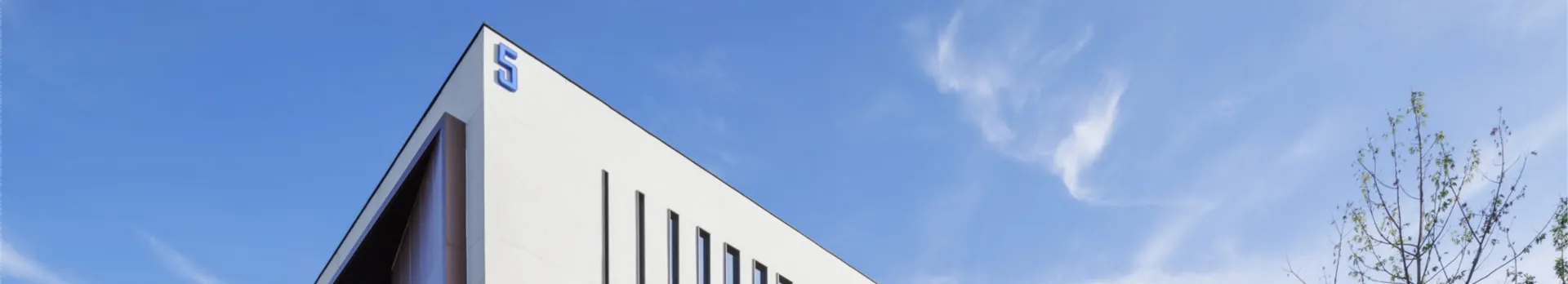 Company building and sky.